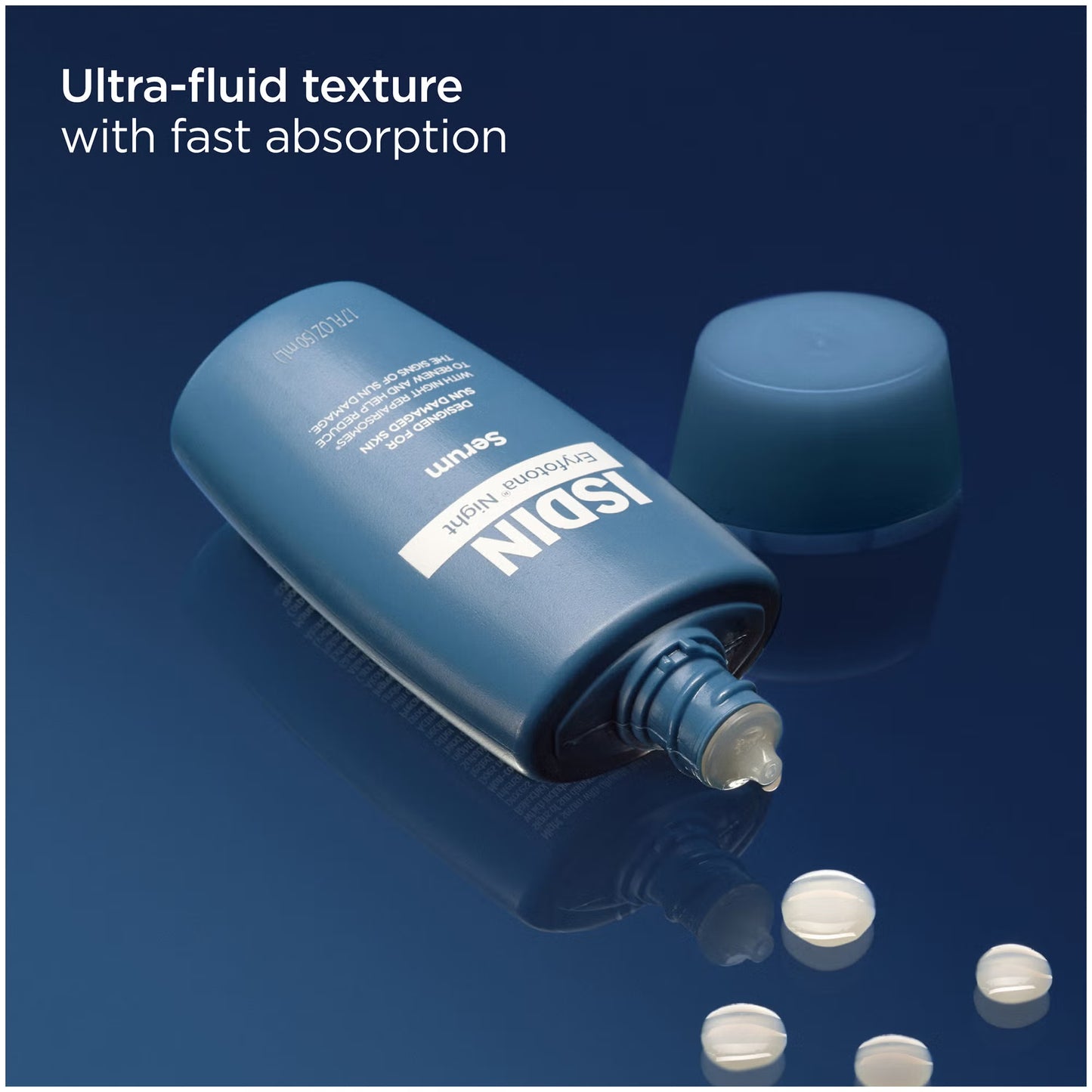 Blue ISDIN bottle with ultra-fluid texture and fast absorption text on a dark blue background