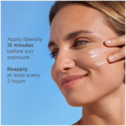 Woman applying sunscreen with text on a blue background