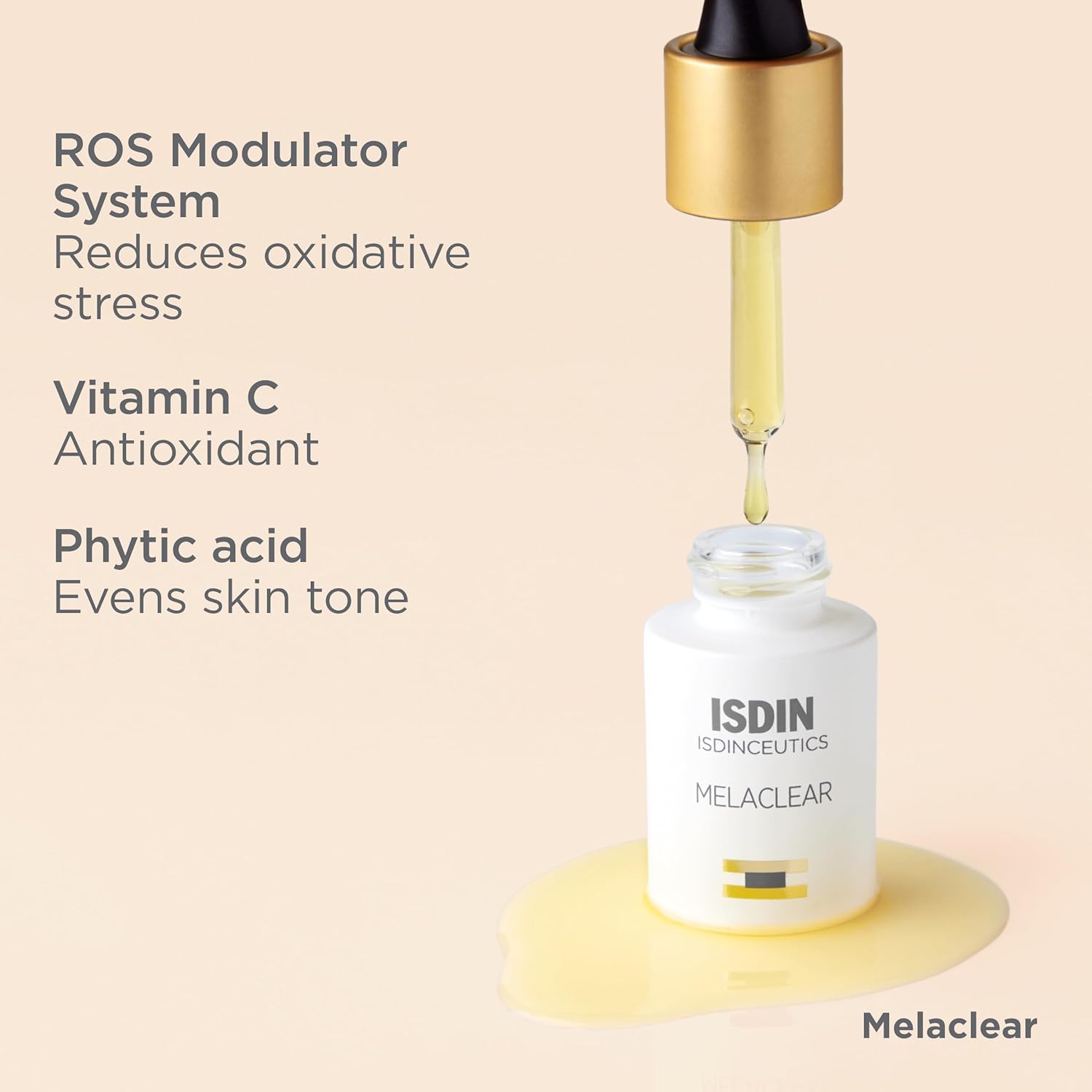 ISDIN Melaclear serum bottle with dropper on a beige background
