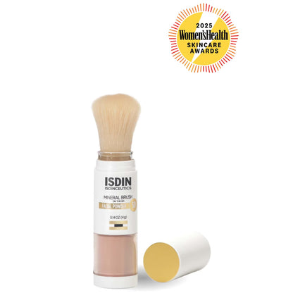 ISDIN mineral brush with facial powder on a white background, featuring the 2025 Women's Health Skincare Awards logo.