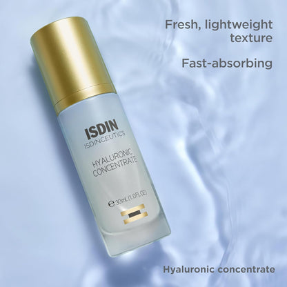 ISDIN Hyaluronic Concentrate bottle with gold cap on a light blue background