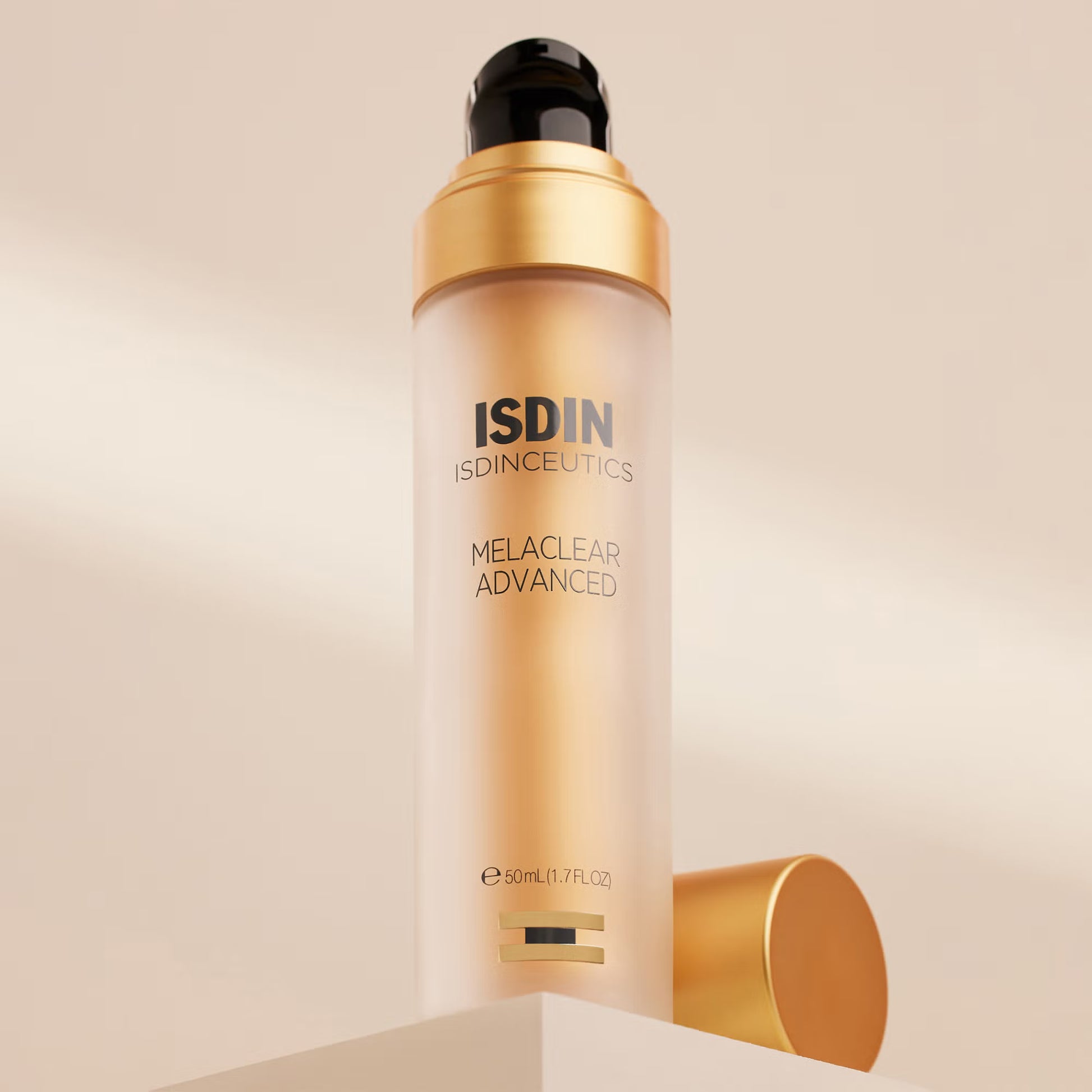 ISDIN skincare bottle on a beige background