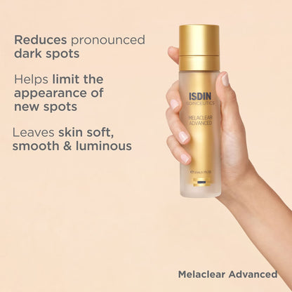 Hand holding a bottle of ISDIN Melaclear Advanced on a beige background with product benefits text.
