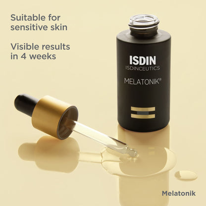 ISDIN skincare product with dropper on a beige background