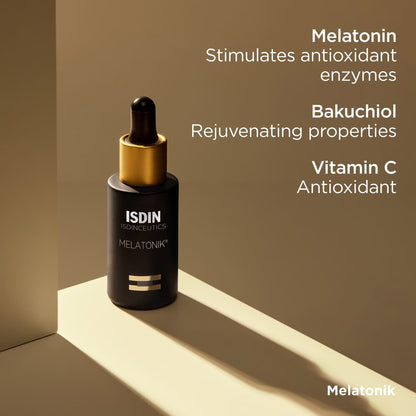 ISDIN Melatonik skincare dropper bottle with product benefits text on a beige background